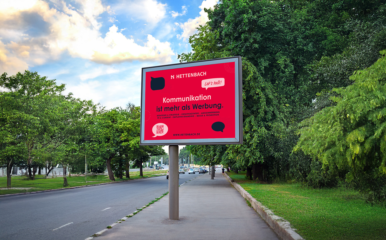 Bild einer Plakatgroßfläche an einer befahrenen Straße
